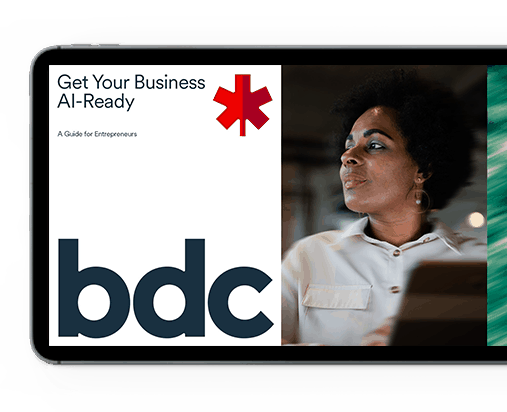 tablet showing the cover of BDC's artificial intelligence ebook